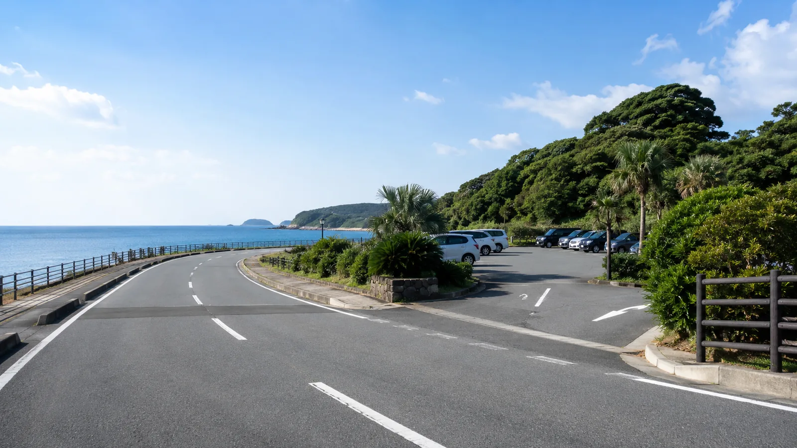 志賀島の海沿い道路と駐車場入口を表現したイメージ画像